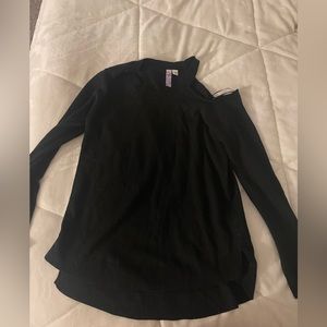 Black sweater exposed shoulder